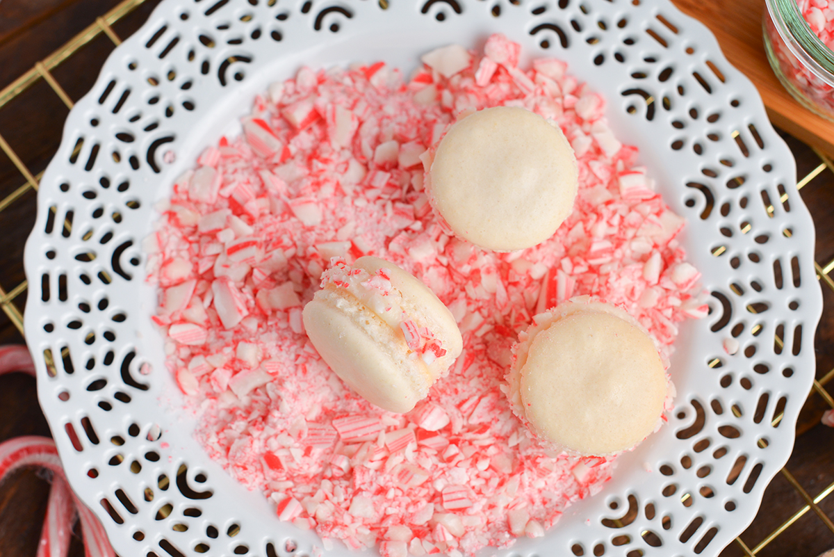 overhead of peppermint macarons in crushed peppermint candy