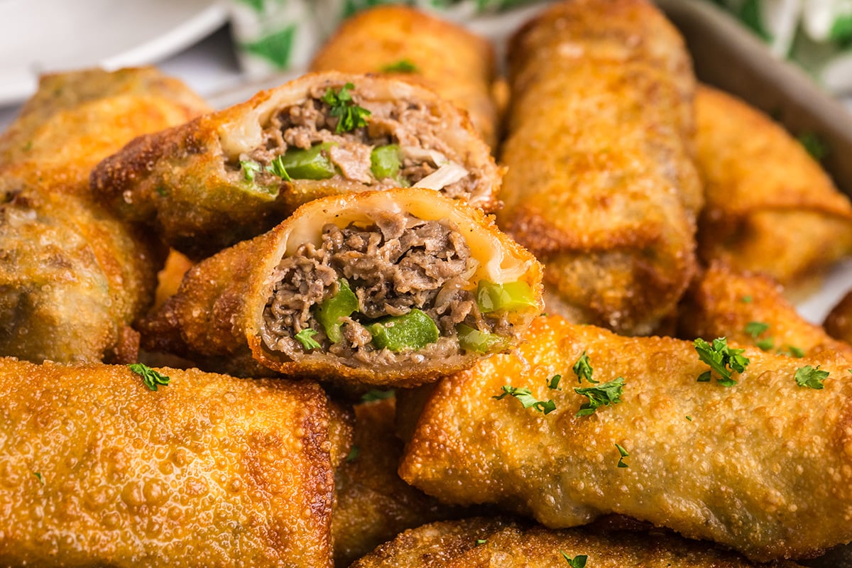 straight on shot of philly cheese steak egg roll cut in half