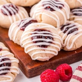 angled shot of tray of thumbprint jam cookies