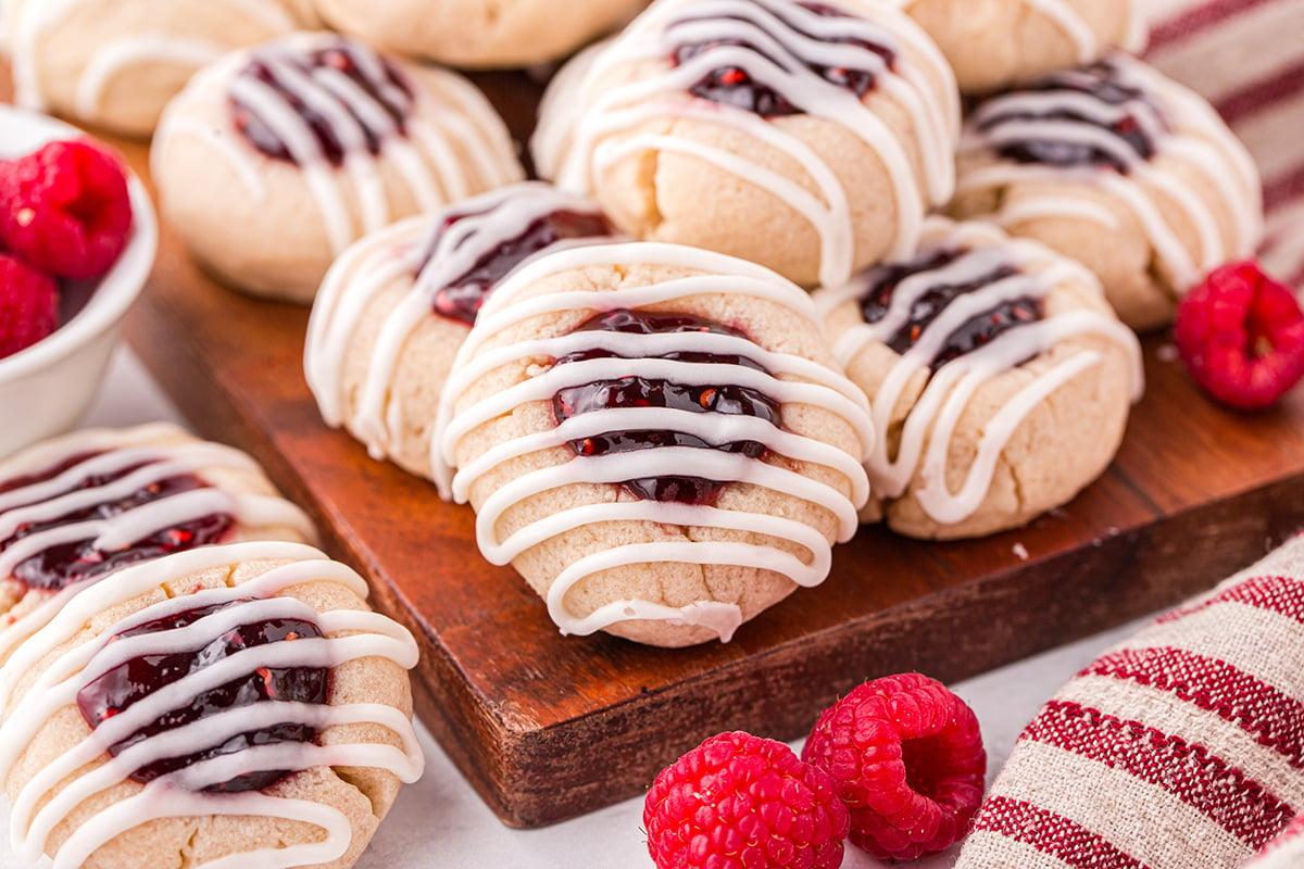 angled shot of tray of thumbprint jam cookies