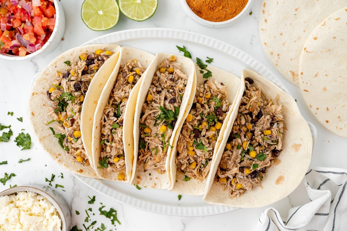 overhead shot of platter of crock pot chicken tacos