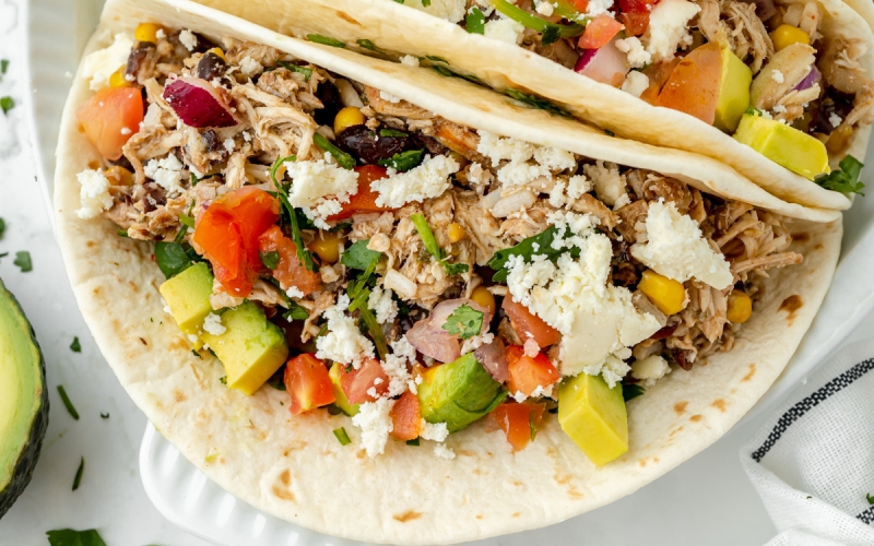 angled shot of slow cooker chicken tacos