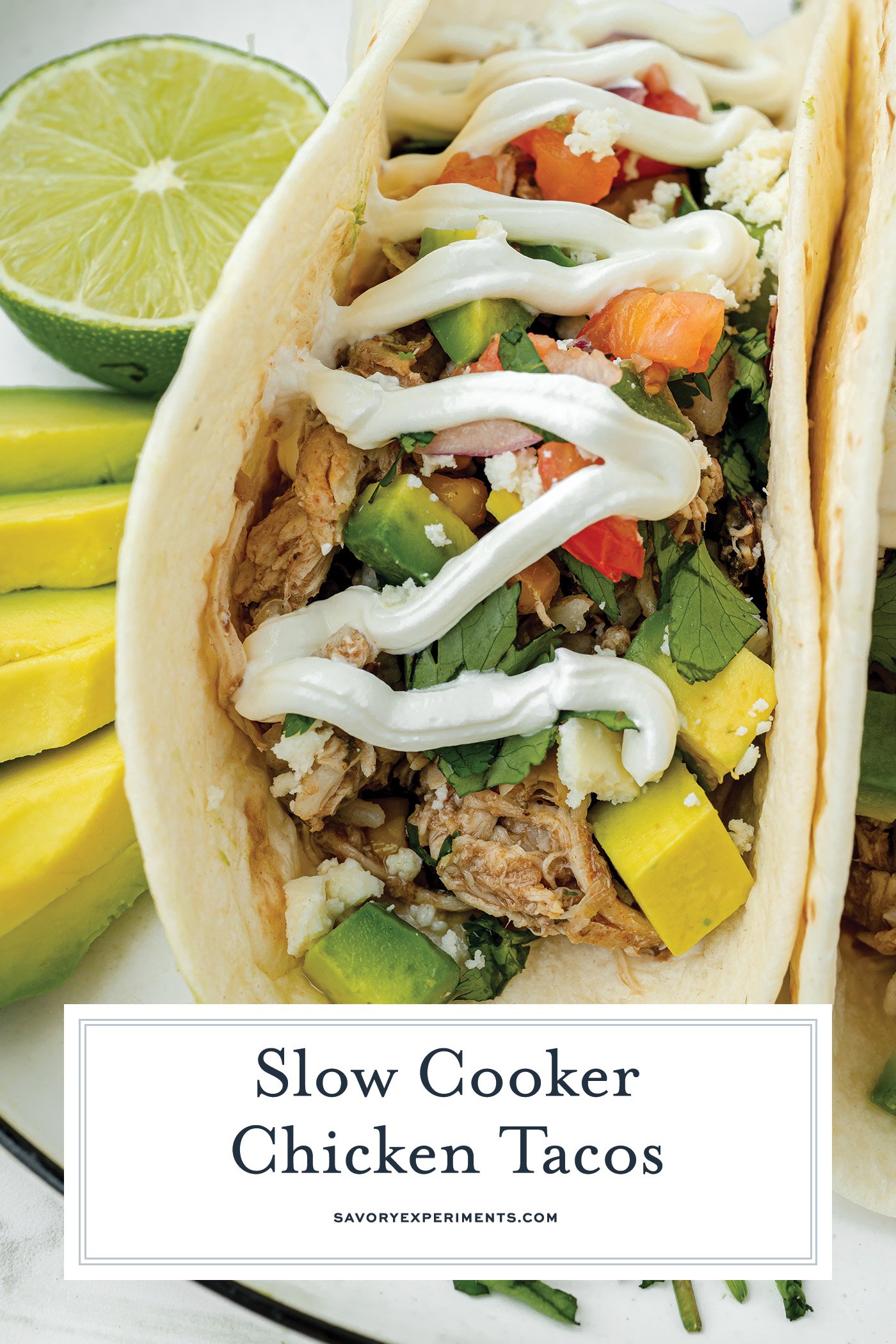 close up angled shot of slow cooker chicken taco with text overlay for pinterest