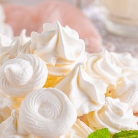 close up of white meringue cookies