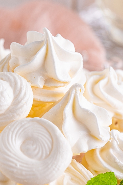 close up of white meringue cookies