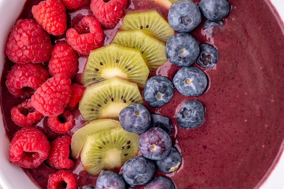 close up overhead shot of fruit in smoothie bowl