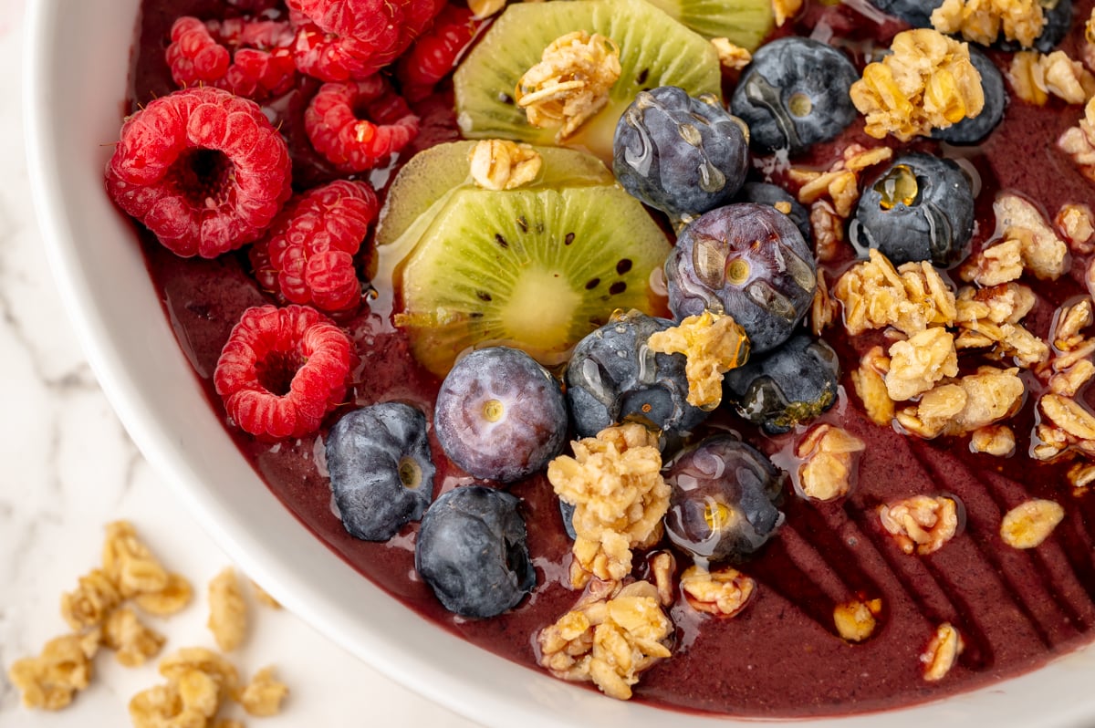 close up overhead quarter shot of toppings in smoothie bowl