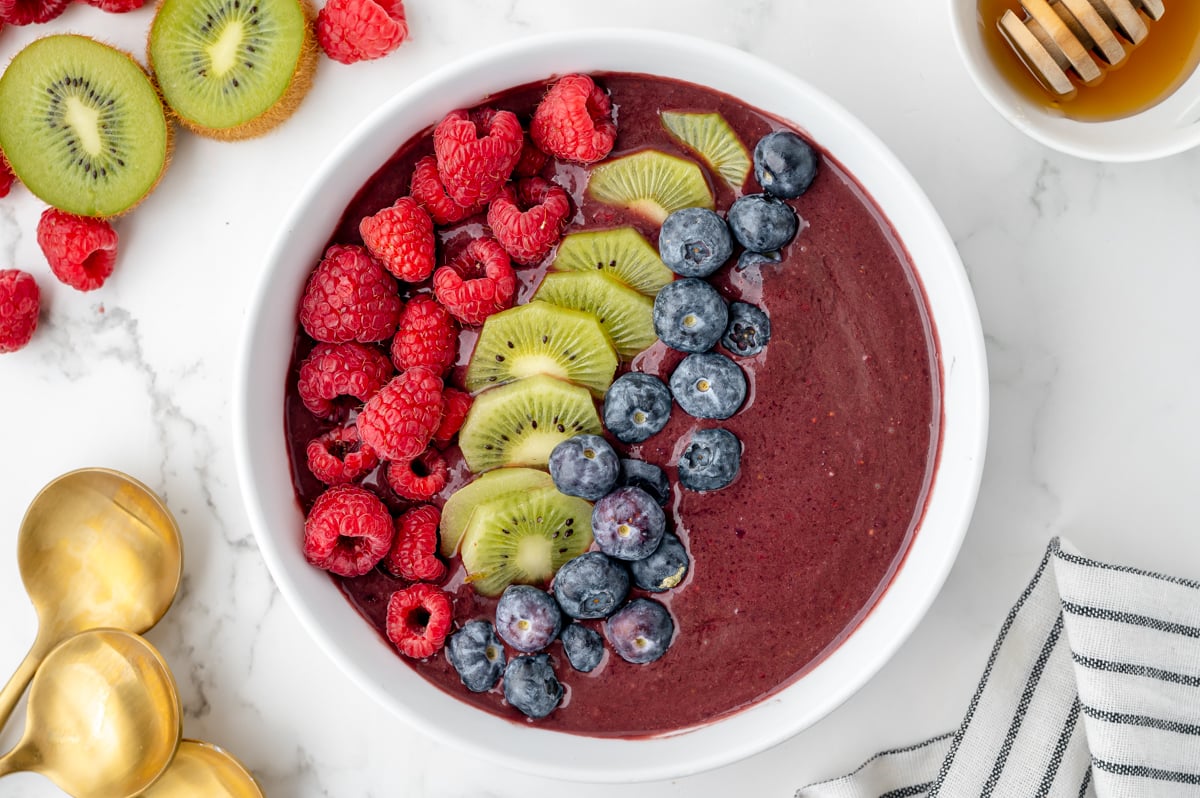overhead shot of fruit in smoothie bowl