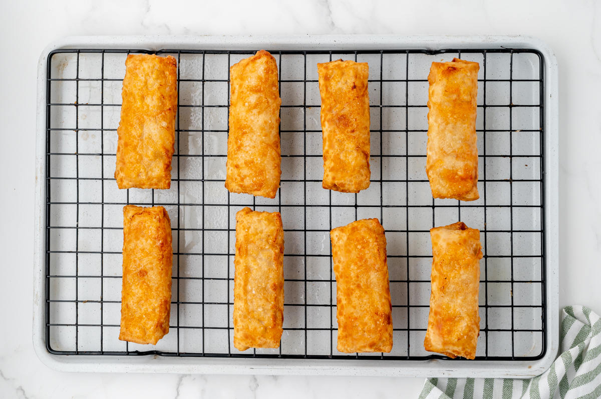 fried egg rolls on wire rack