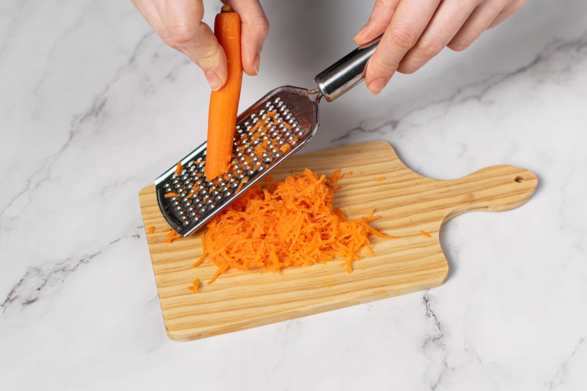 carrots being grated