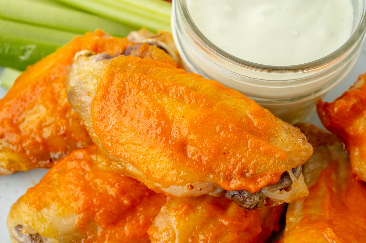 close up of baked buffalo wings