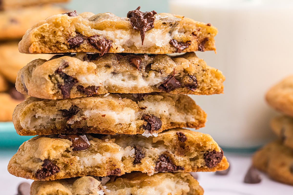 close up of cream cheese centers in chocolate chip cookies