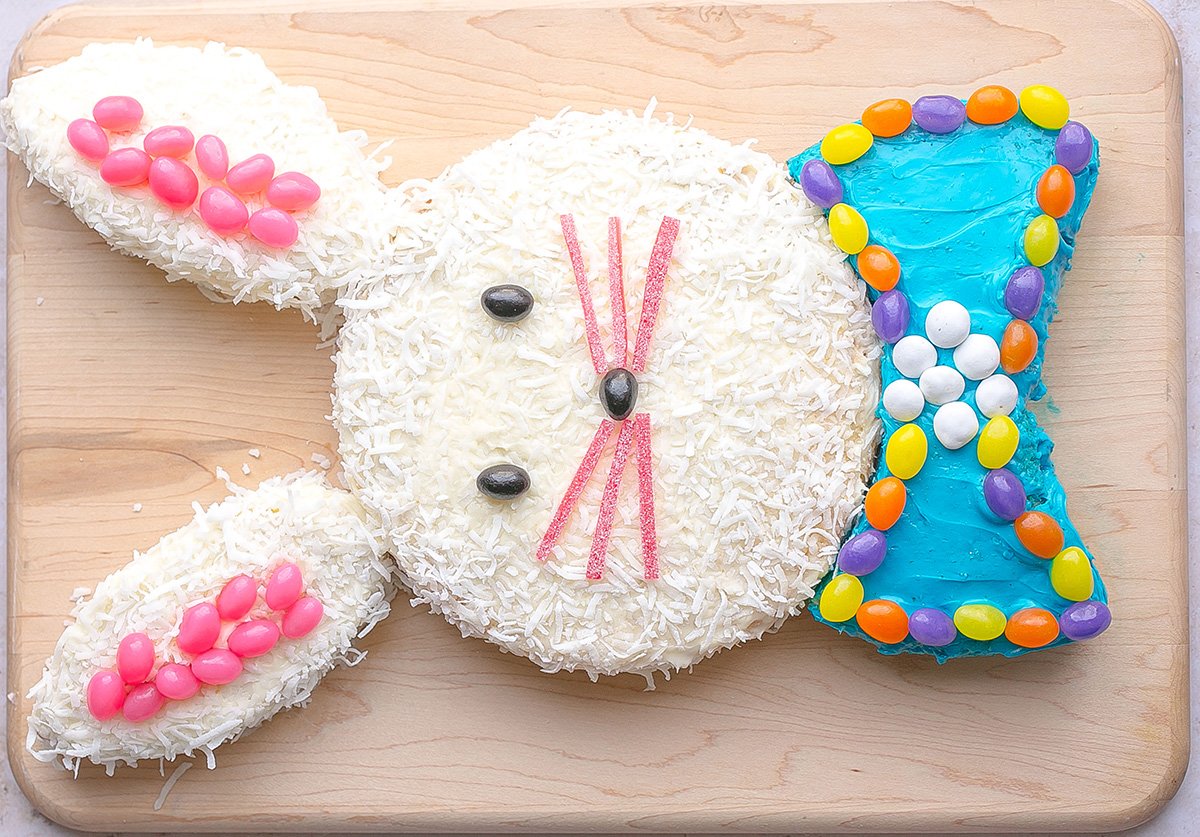 overhead shot of easter bunny cake on cutting board