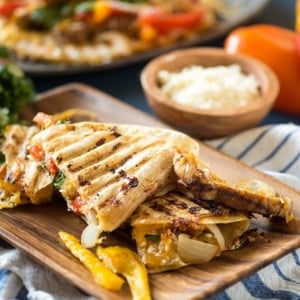 angled shot of grilled chicken quesadilla panini