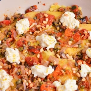 close up angled shot of mediterranean lobster ravioli in pan