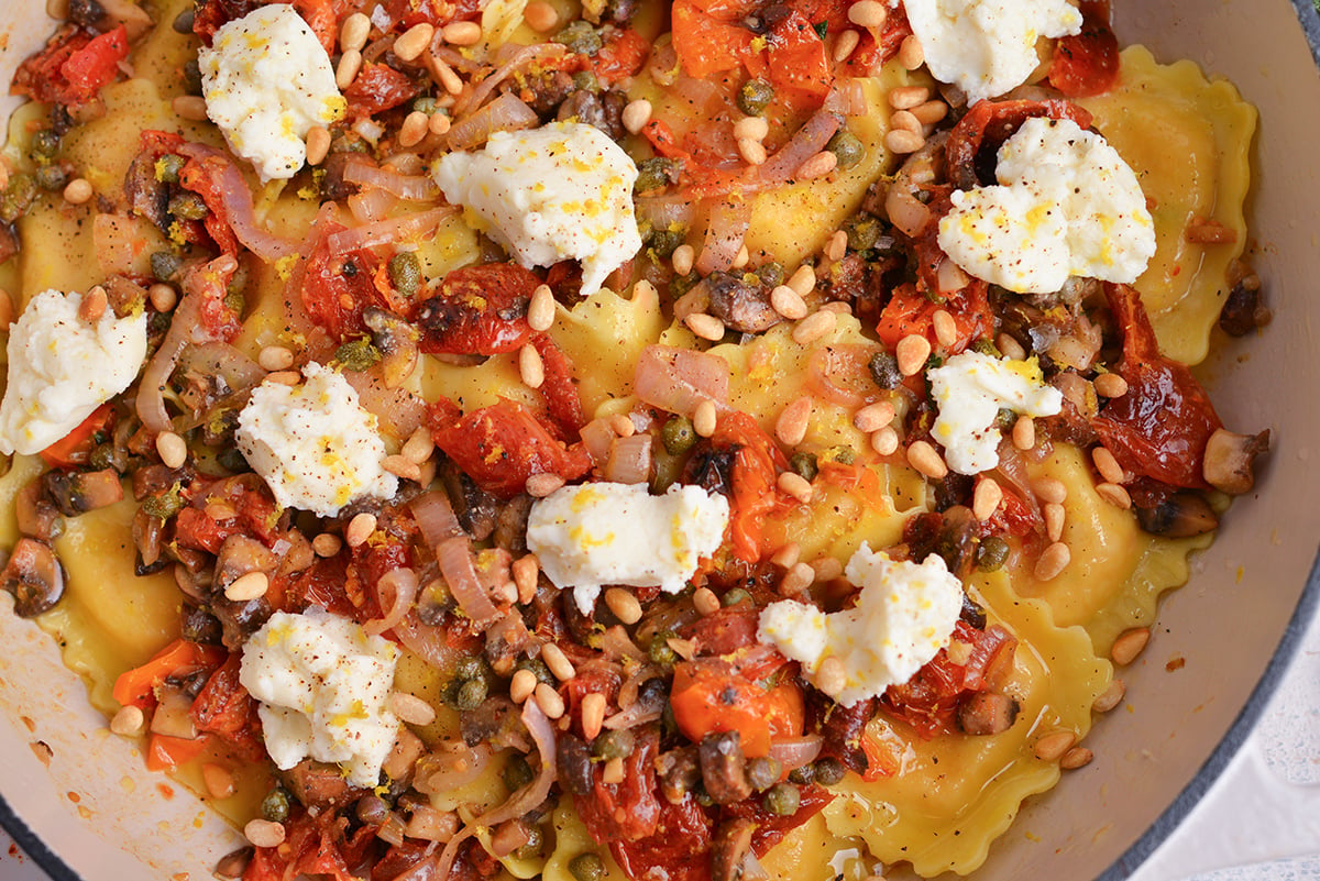 close up overhead shot of mediterranean lobster ravioli in pan