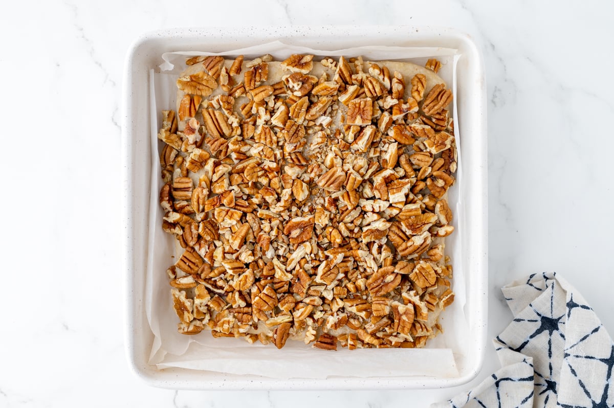 chopped pecans in pan