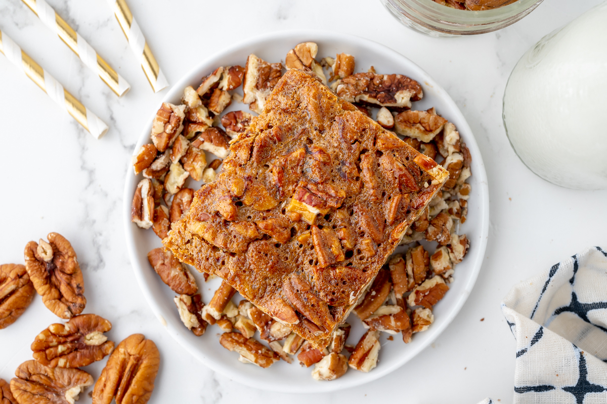 overhead shot of pecan pie bar on plate