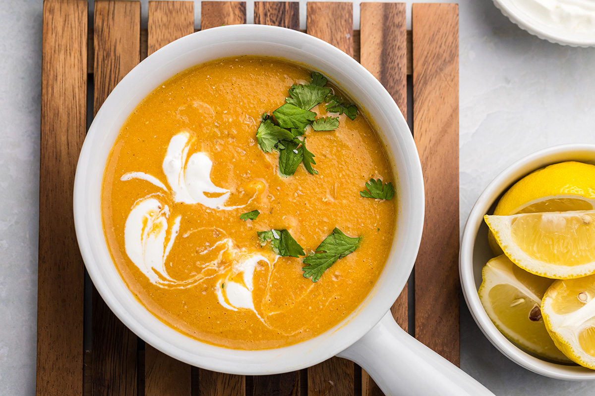 close up overhead shot of bowl of red lentil soup