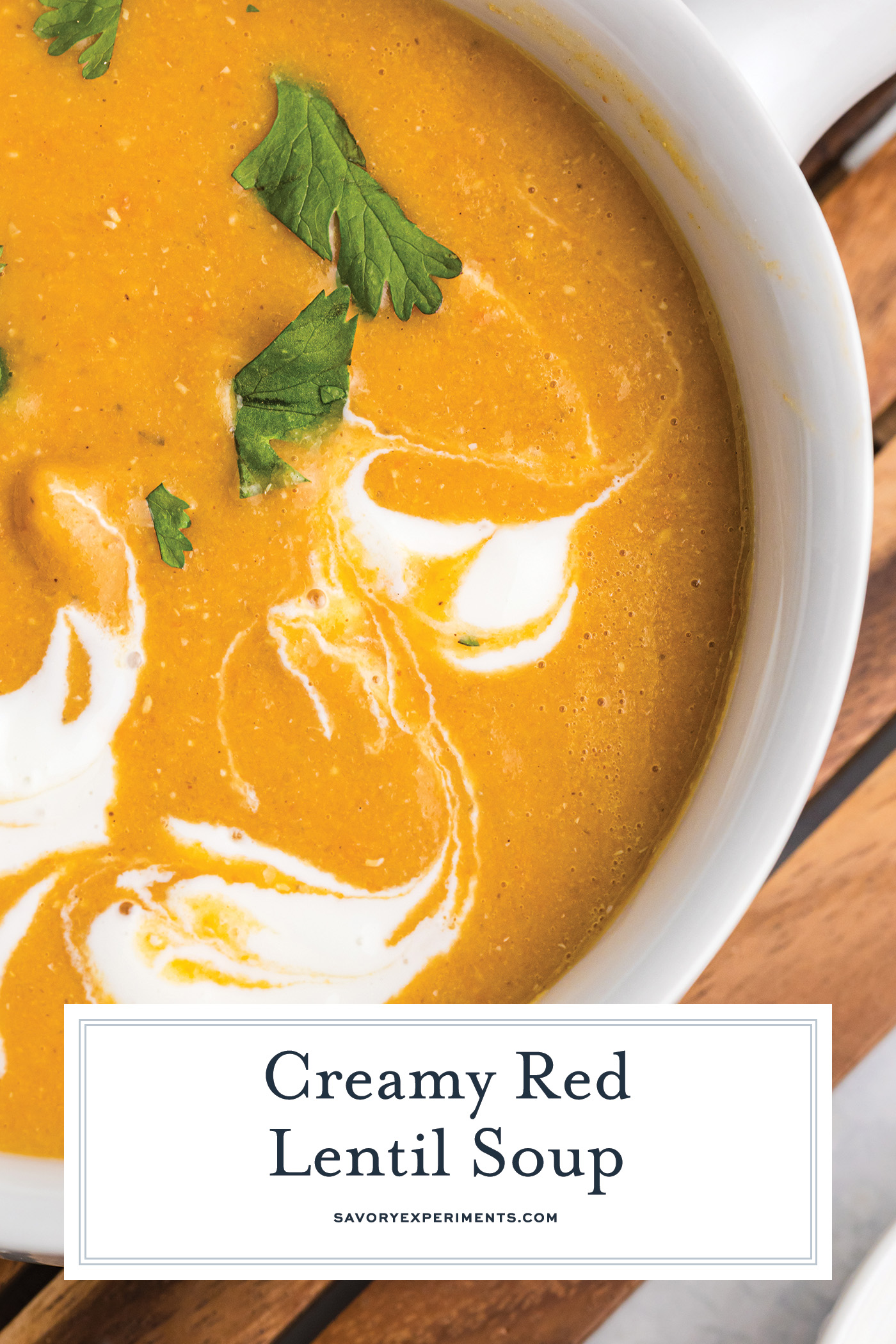 close up overhead shot of bowl of red lentil soup with text overlay for pinterest