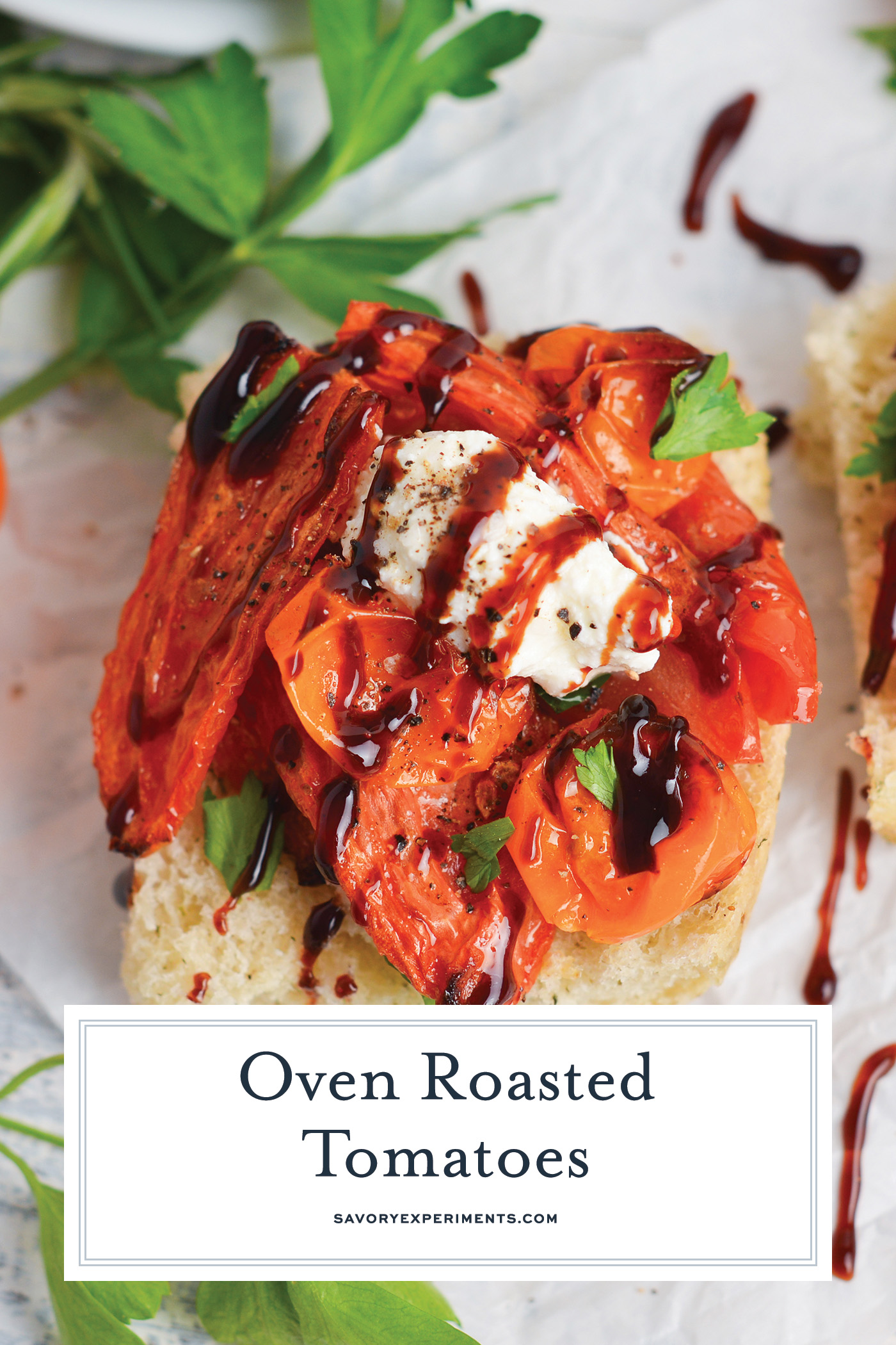 close up angled shot of oven roasted tomatoes on crostini with text overlay for pinterest