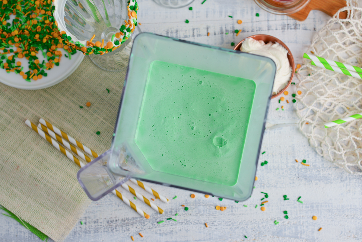 overhead shot of shamrock shake in blender