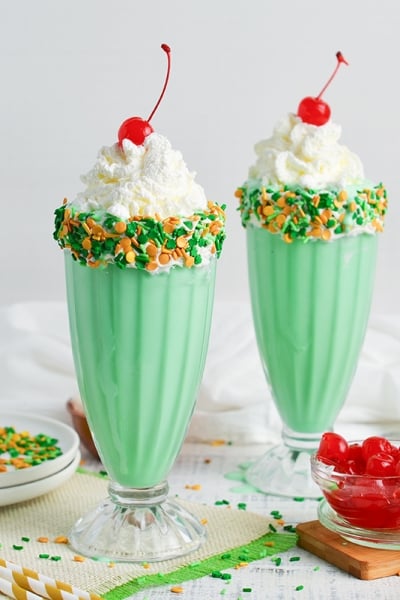 straight on shot of two shamrock shakes