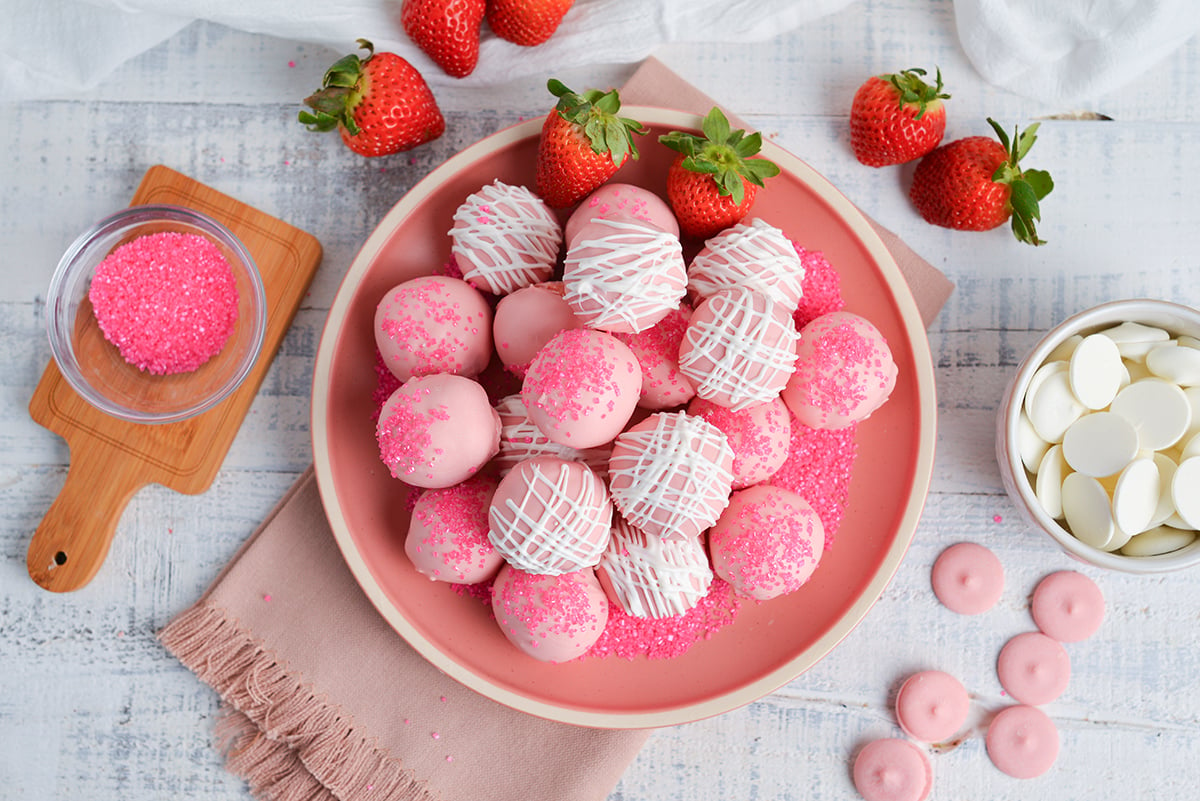 overhead shot of plate of strawberry cheesecake bites