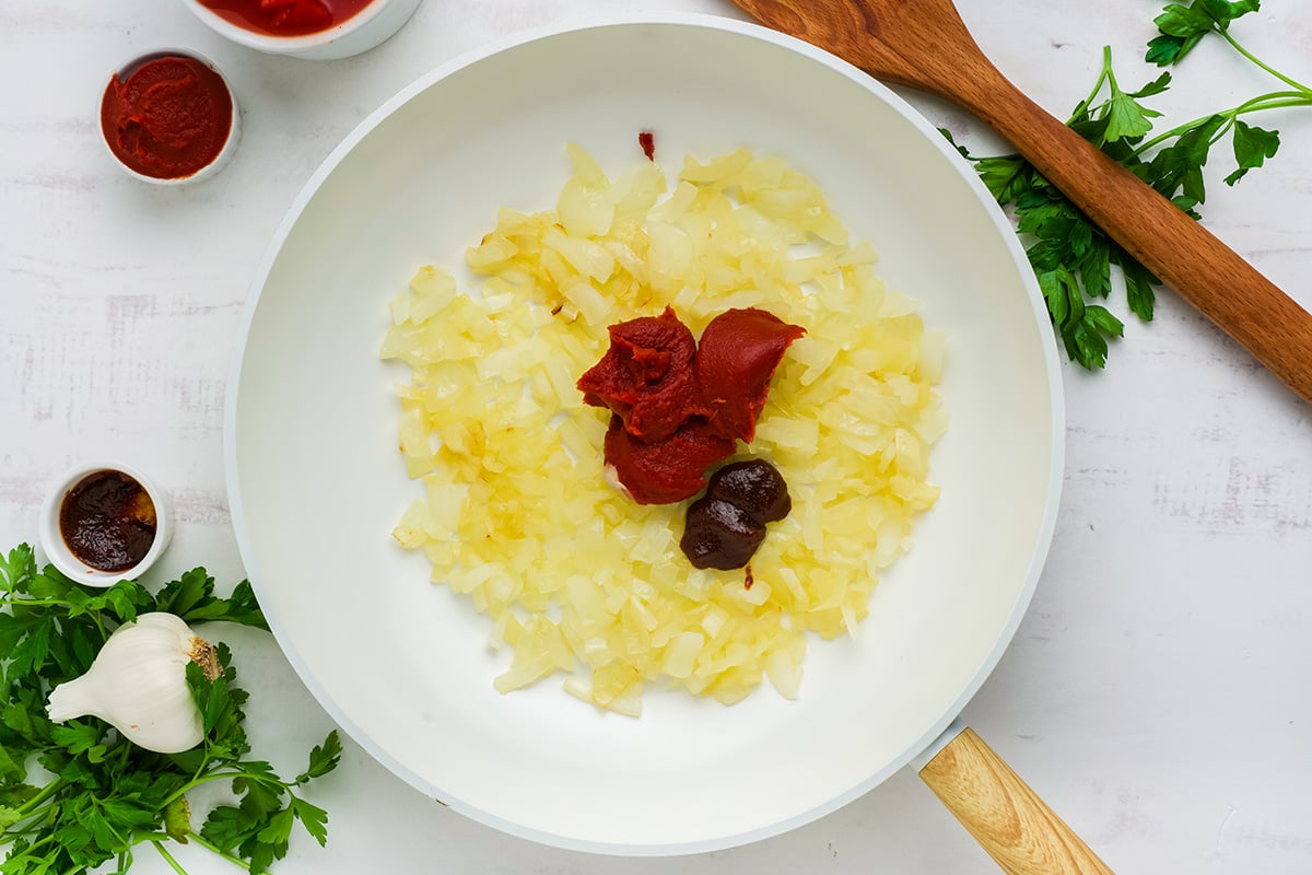 tomato paste added to onion