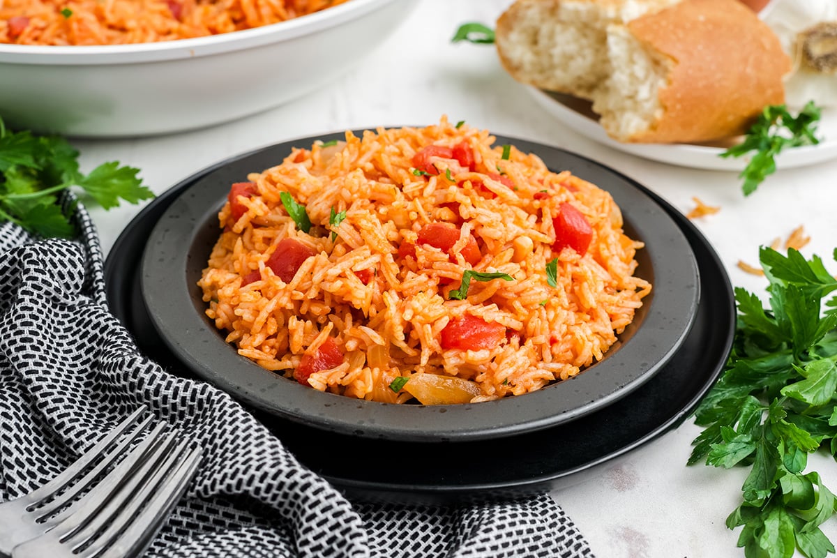 angled shot of plate of tomato rice