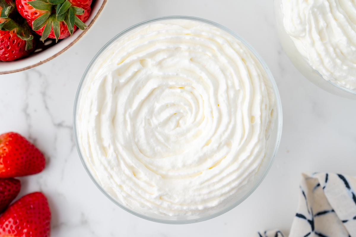 overhead shot of bowl of homemade whipped cream