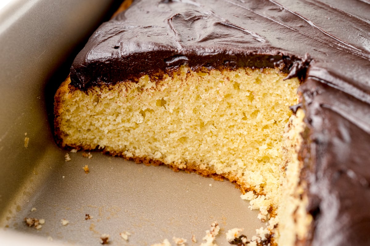 cut piece of yellow sheet cake