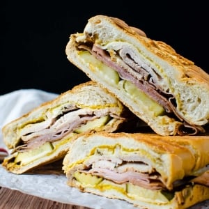 straight on shot of cuban sandwich cut in half