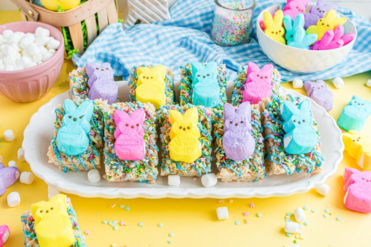 two rows of peep rice krispie treats on a white tray