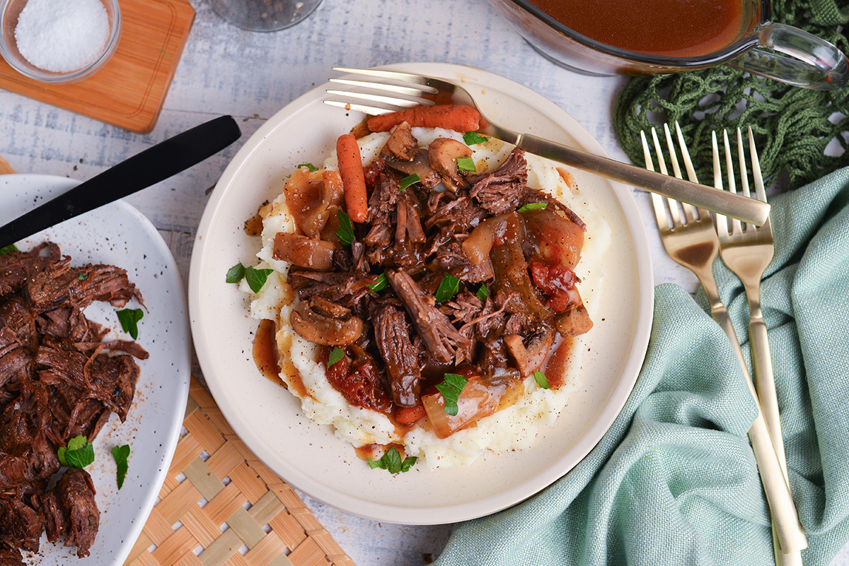 overhead shot of plate of balsamic slow cooker pot roast