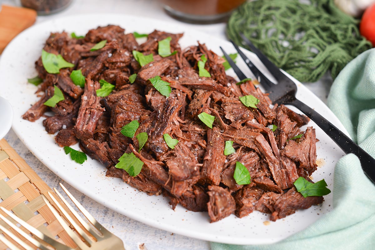 angled shot of platter of balsamic slow cooker pot roast