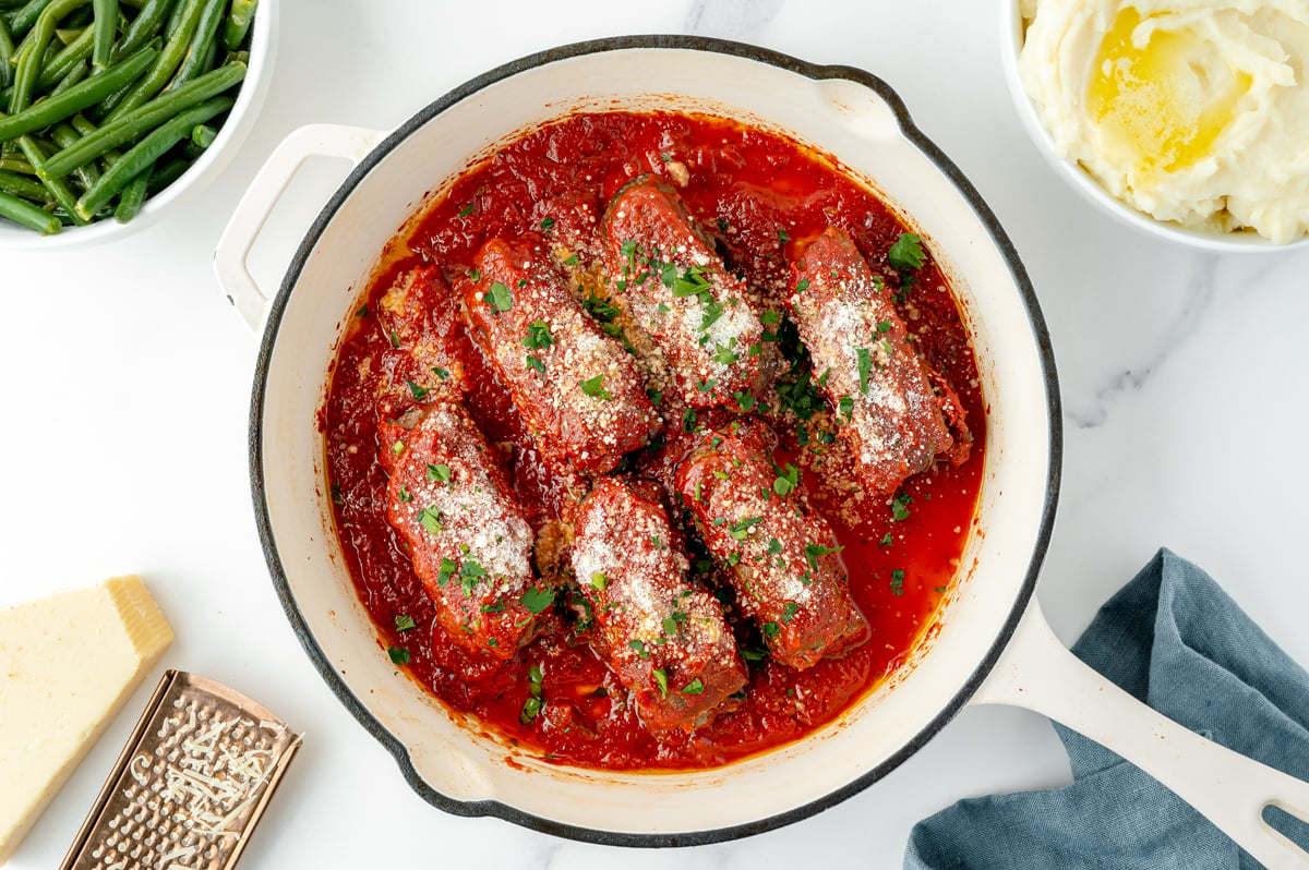 overhead shot of beef braciole in pan