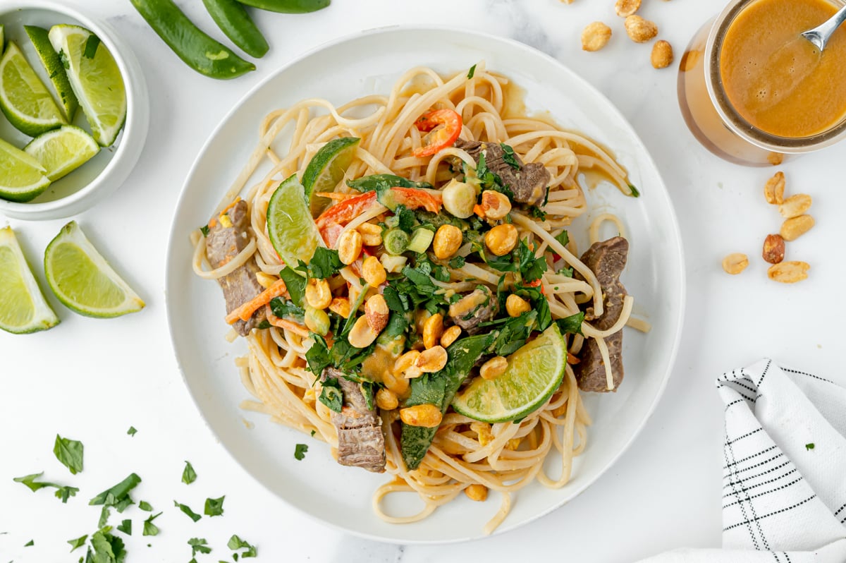 overhead shot of plate of beef pad thai