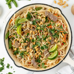 overhead shot of pan of beef pad thai