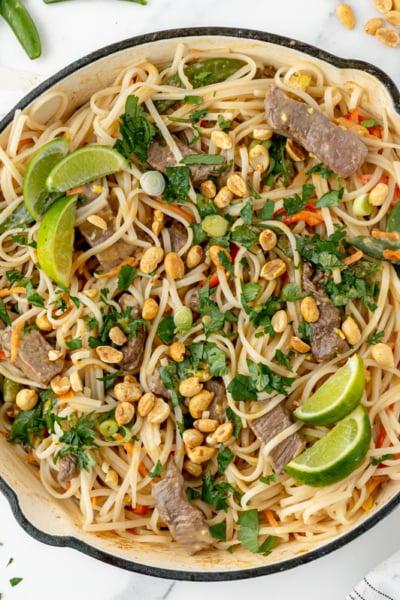 overhead shot of pan of beef pad thai