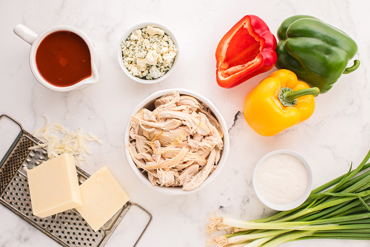 overhead shot of buffalo chicken stuffed peppers ingredients