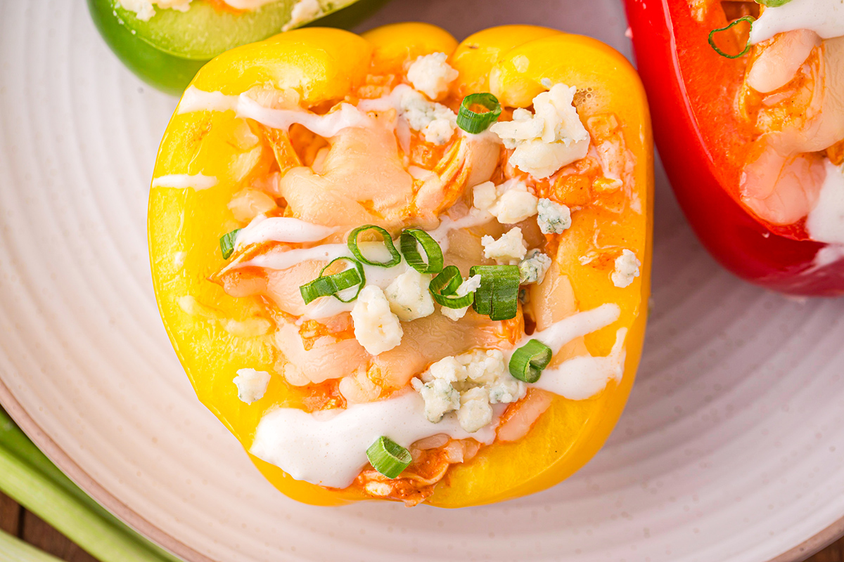 overhead shot of yellow buffalo chicken stuffed pepper