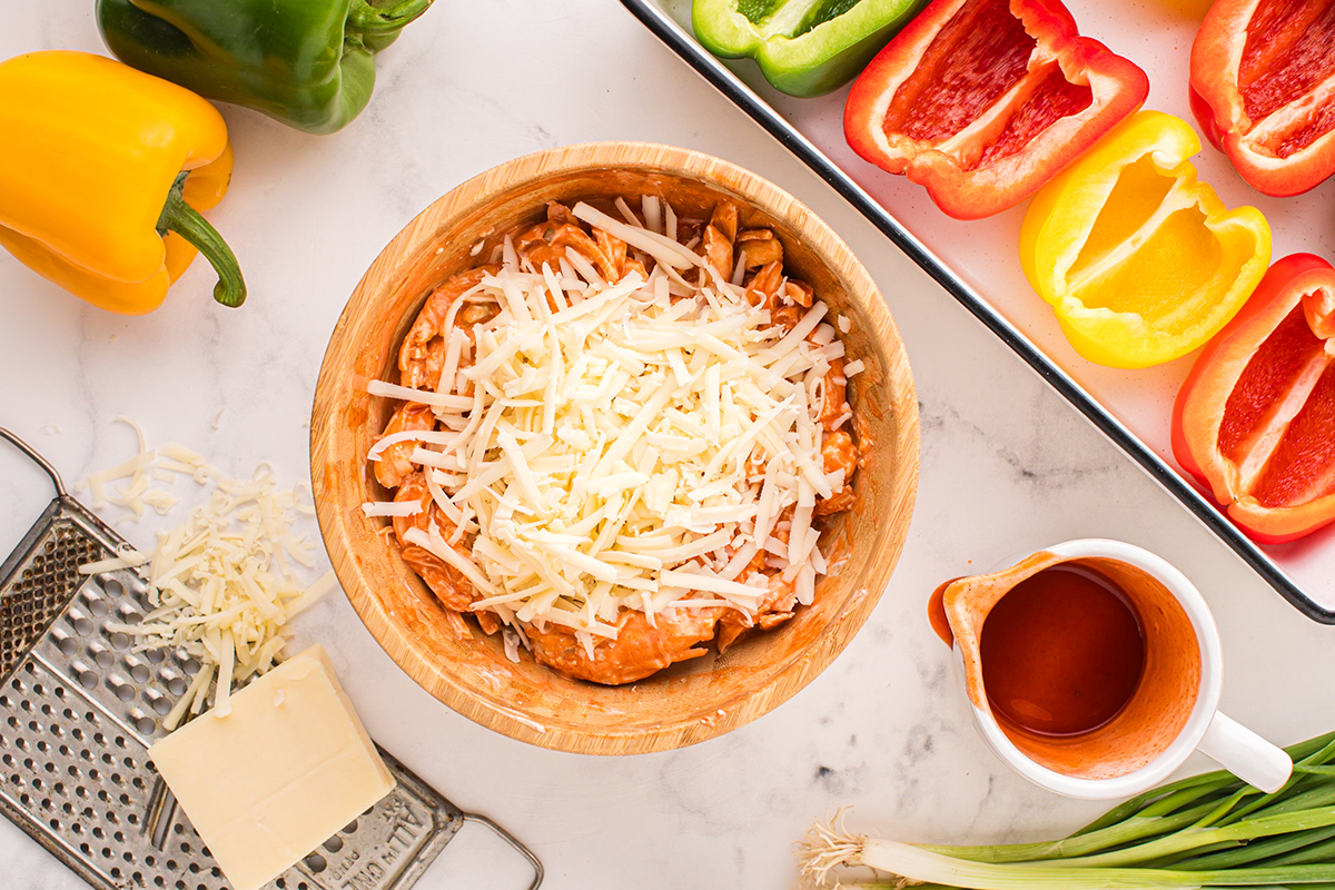 shredded cheese added to buffalo chicken