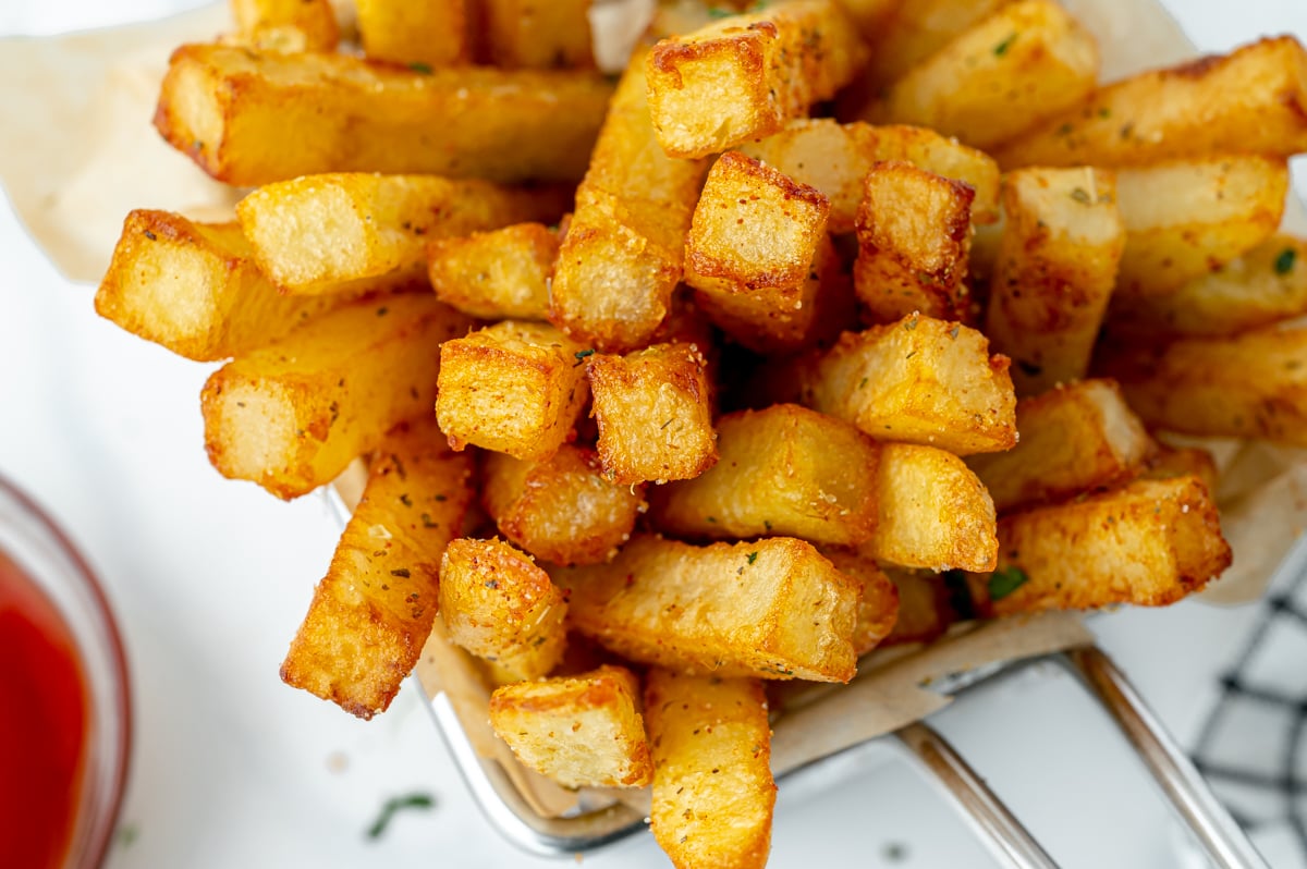 close up overhead shot of basket of cajun fries