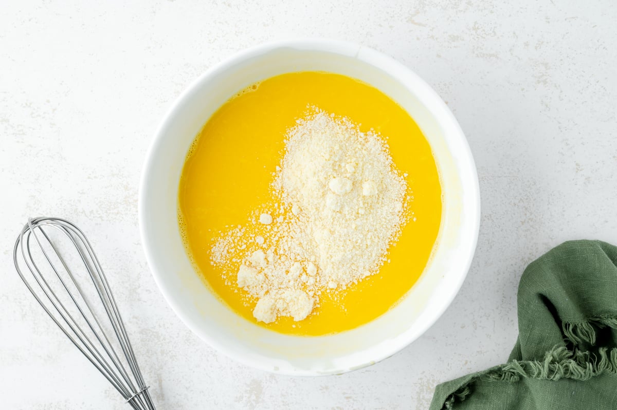 overhead shot of eggs and cheese in bowl