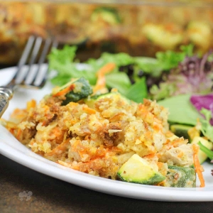 close up angled shot of chicken zucchini casserole on plate