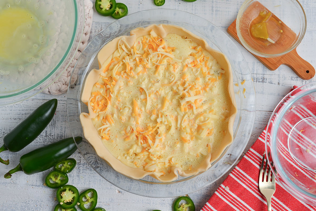 overhead shot of unbaked chile relleno quiche