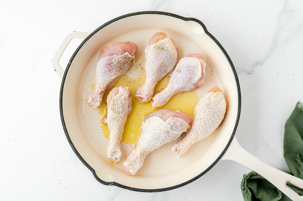 chicken cooking in pan