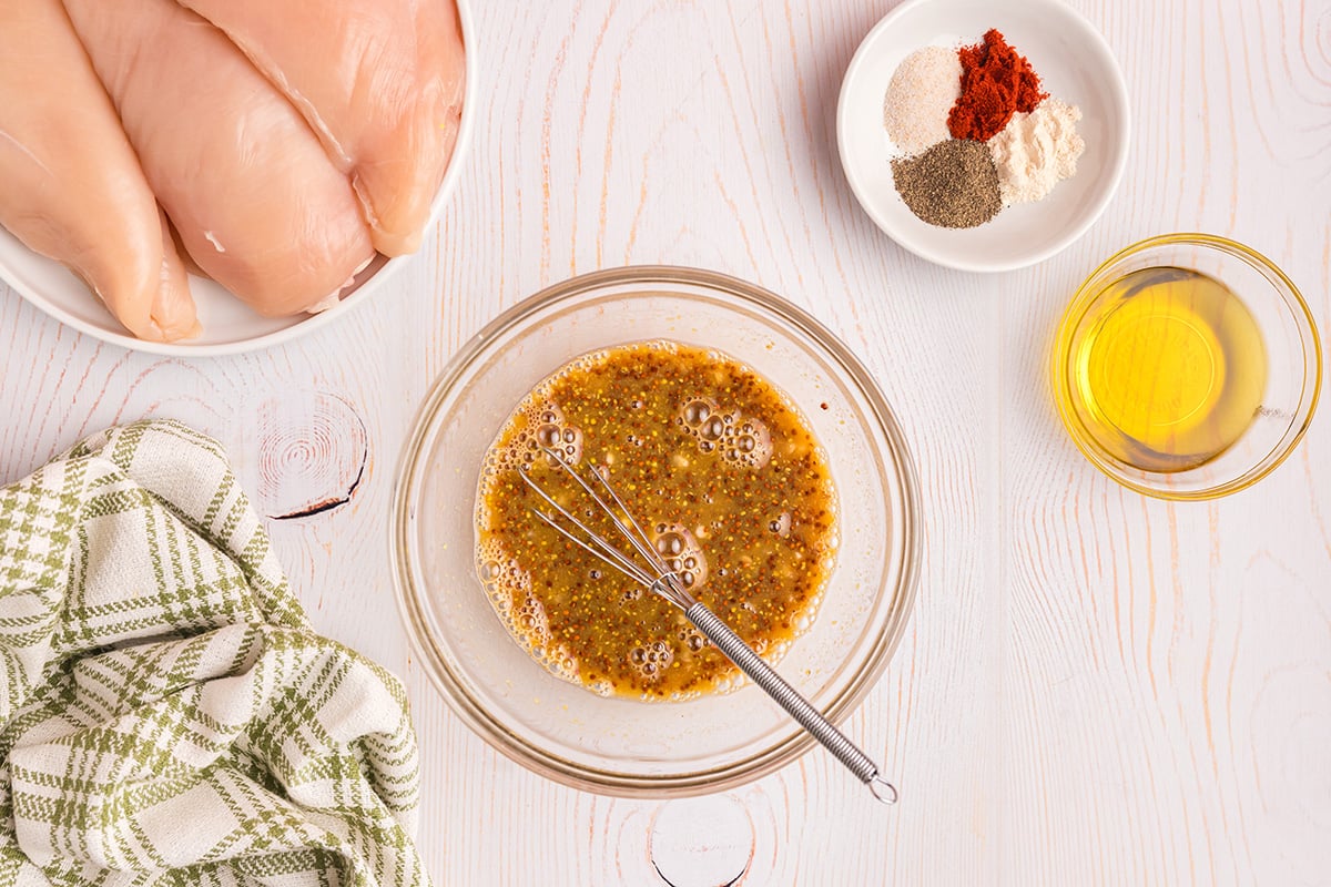 overhead shot of honey mustard sauce in bowl