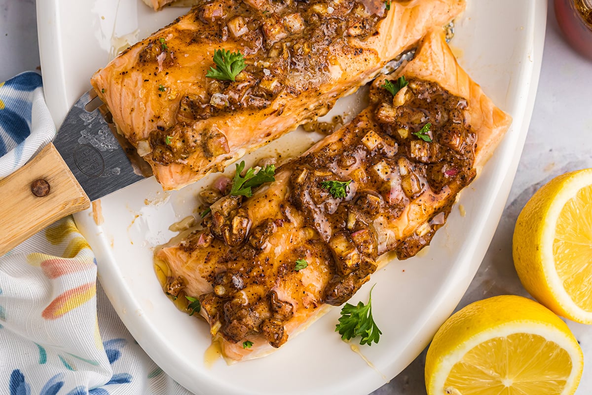 overhead shot of spatula picking up hot honey salmon